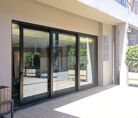 Puerta corredera de vidrio de aluminio de alta resistencia al aire estilo de diseño moderno con ruptura térmica